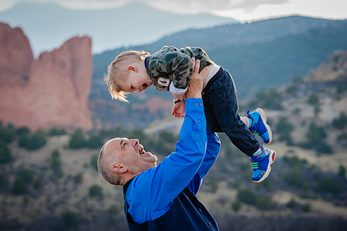 James Boelens hold child